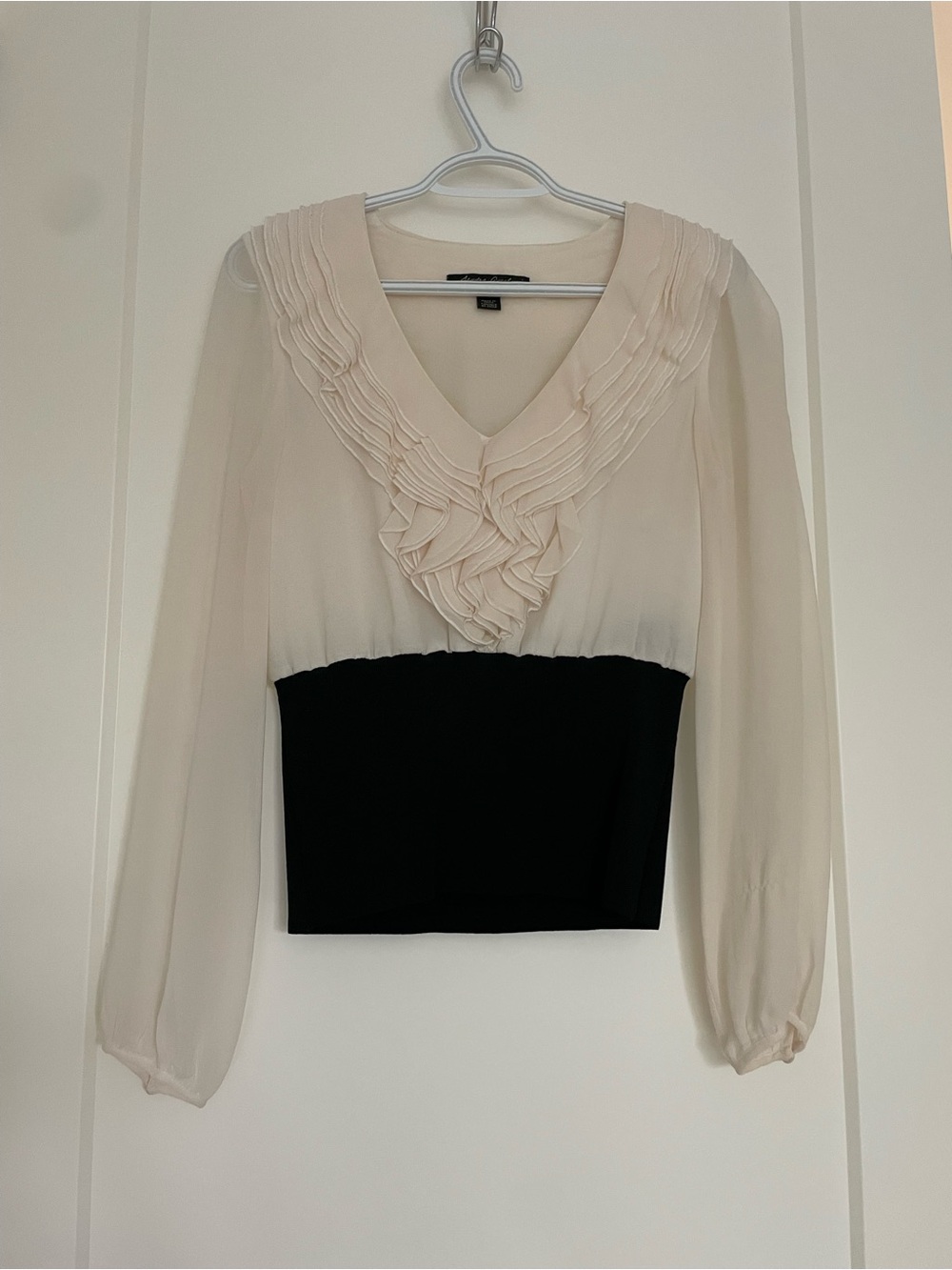 Women's Two-Tone Ruffle V-Neck Top in Cream and Black